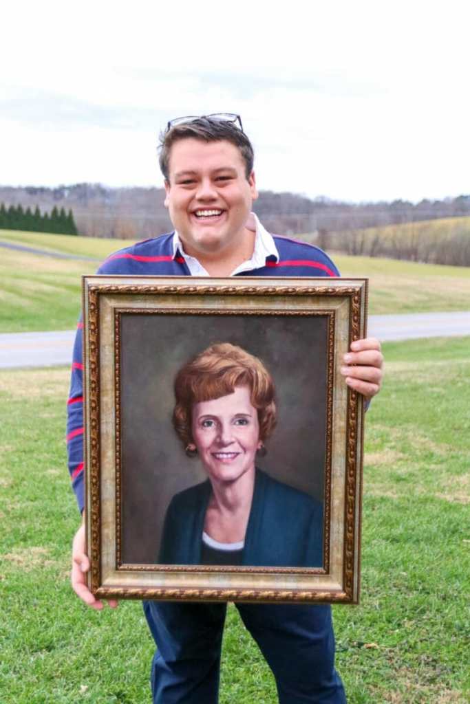 JC Phelps, Kentucky Blogger, With Oil Painting of Family