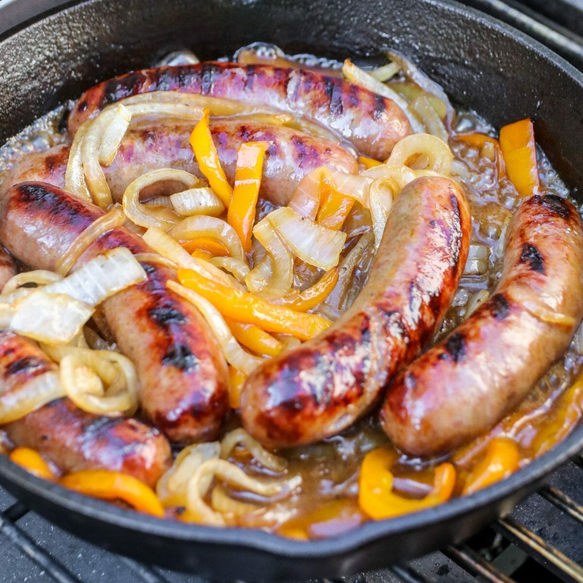 Cast Iron Brats with Peppers and Onions - Fresh Off The Grid